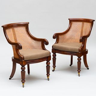 Pair of Late Regency Carved Mahogany and Caned Armchairs