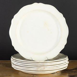 Group of Eight French Creamware Plates with Shaped Rims