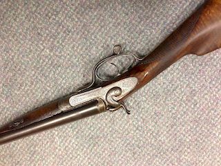 William Ford, a 16 bore hammer gun, No 165 (Barrel No. 12767), with 28" barrels, the frame with scro