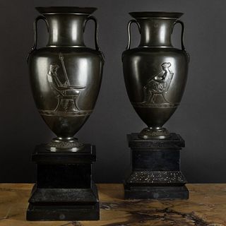 Pair of Neoclassical Bronze Urns on Black Marble Bases, After the Antique