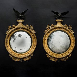 Fine Pair of Regency Giltwood and Ebonized Convex Mirrors