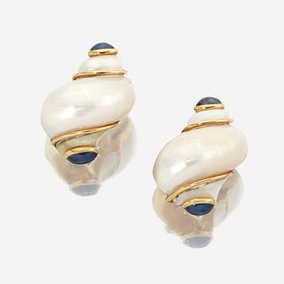 A pair of turbo shell, sapphire, and eighteen karat gold earclips, Seaman Schepps