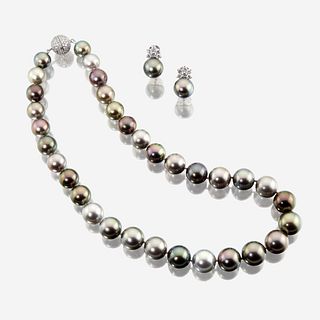 A South Sea Tahitian cultured pearl, diamond, and eighteen karat white gold necklace with similar earclips
