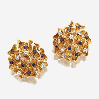 A pair of eighteen karat gold, sapphire, and diamond ear clips