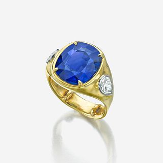 A sapphire, diamond, and eighteen karat gold ring
