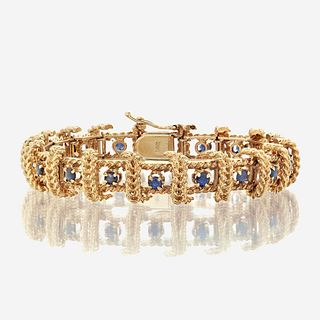 A fourteen karat gold and sapphire bracelet
