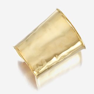 An eighteen karat gold cuff bracelet