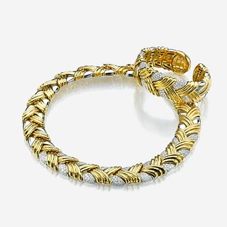 An eighteen karat two tone gold and diamond necklace with matching bracelet Italy