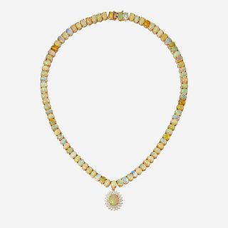 An opal, diamond, and fourteen karat gold necklace