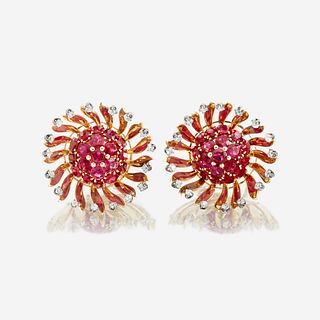 A pair of eighteen karat gold, ruby, and diamond earrings