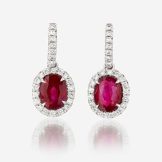 A pair of ruby, diamond, and platinum earrings