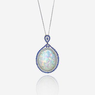 An opal, diamond, sapphire, and fourteen karat gold pendant with chain