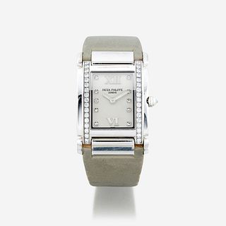 A lady's eighteen karat white gold and diamond, strap wristwatch, Patek Philippe Twenty Four