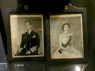Two signed framed official photographs of Queen Elizabeth and Prince Philip, dated 1956, some fading