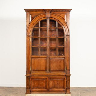 L. 19TH C. ENGLISH ARCHED TWO-DOOR OAK CABINET