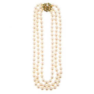 A Triple Strand of Pearls with 14K Diamond Clasp