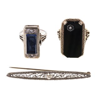 A Collection of Art Deco Jewelry in Gold