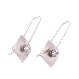 A Pair of 14K Modern Diamond Dangle Earrings