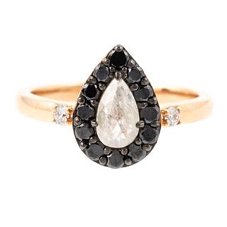 A Pear Shape Diamond & Black Diamond Ring in 18K