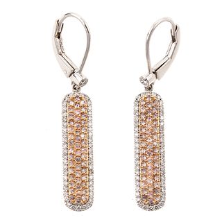A Pair of Fancy Pink Diamond Earrings in 18K