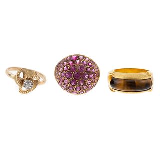 A Trio of Diamond & Gemstone Rings in Gold