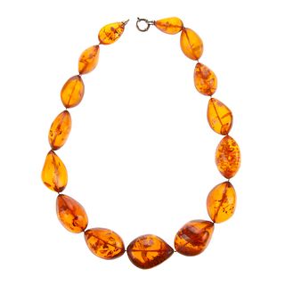 An Extraordinary Large Amber Beaded Necklace