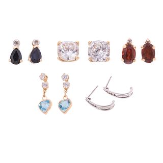 A Collection of Gemstone Earrings in Gold