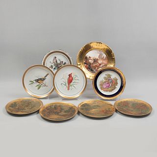 Lote de 9 platos decorativos. Alemania y Francia. Siglo XX. Elaborados en porcelana, unos de Bavaria y Limoges.