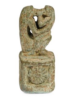 An Egyptian Faience of Kissing Baboons Amulet
Height 1 1/2 inches. 