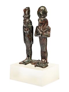 An Egyptian Bronze Dyad of Isis and Horus  
Height 3 inches.