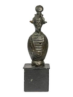 An Egyptian Bronze Canopic Osiris
Height 3 3/8 inches. 