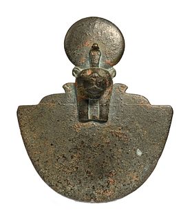 An Egyptian Bronze Lion Headed Aegis
Height 4 x width 3 1/4 inches. 