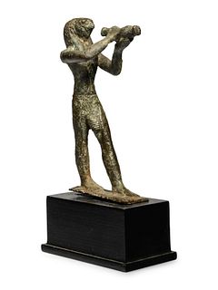 An Egyptian Bronze Horus
Height 2 1/2 inches.