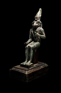 An Egyptian Bronze Khnum
Height 8 1/2 inches.