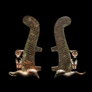 A Pair of Egyptian Bronze Ostrich Plumes
Height 6 inches. 