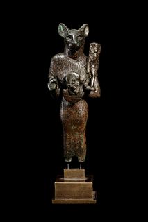 An Egyptian Bronze Bastet
Height 5 1/4 inches. 