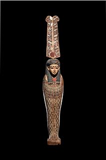 An Egyptian Painted Wood Ptah-Sokar-Osiris
Height 19 1/2 inches.
