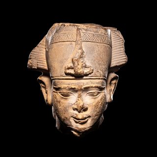 An Egyptian Limestone Head of Osiris
Height 4 inches.