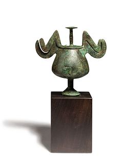 A Greek Bronze Lidded Pyxis
Height 4 3/4 x width 4 3/4 inches. 