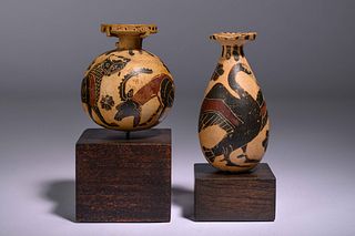 Two Corinthian Black-Figured Vessels: An Aryballos and An Alabastron
Heights: 2 3/4 & 3 1/4 inches.