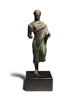 A Greek Bronze Apollo  
Height 6 1/4 inches. 