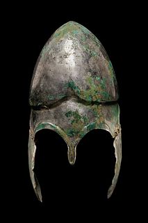 A Chalcidian Tinned Bronze Helmet
Height 14 inches.