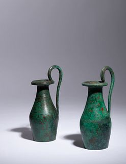 A Pair of Etruscan Bronze Olpai
Height 7 3/4 inches.