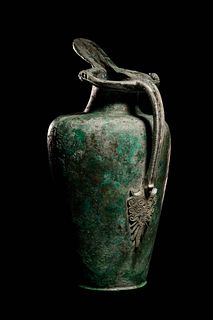 An Etruscan Bronze Oinochoe
Height 12 1/2 inches.