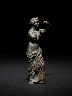 A Roman Bronze Venus
Height 3 5/16 inches.