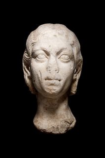A Roman Marble Portrait Head of Julia Paula  
Height 9 1/2 inches. 
