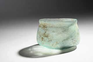 A Roman Blue Glass Wide-Mouthed Bowl
Height 2 1/2 x diameter 3 inches. 