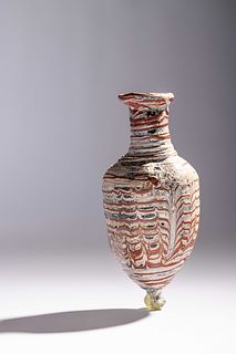 A Greek Core-Formed Glass Amphoriskos
Height 5 1/4 inches. 