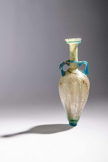 A Roman Glass Flask with Silver Iridescence
Height 8 inches. 