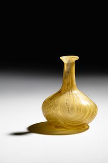 A Roman Marbled Yellow Glass Bottle
Height 2 3/4 inches. 